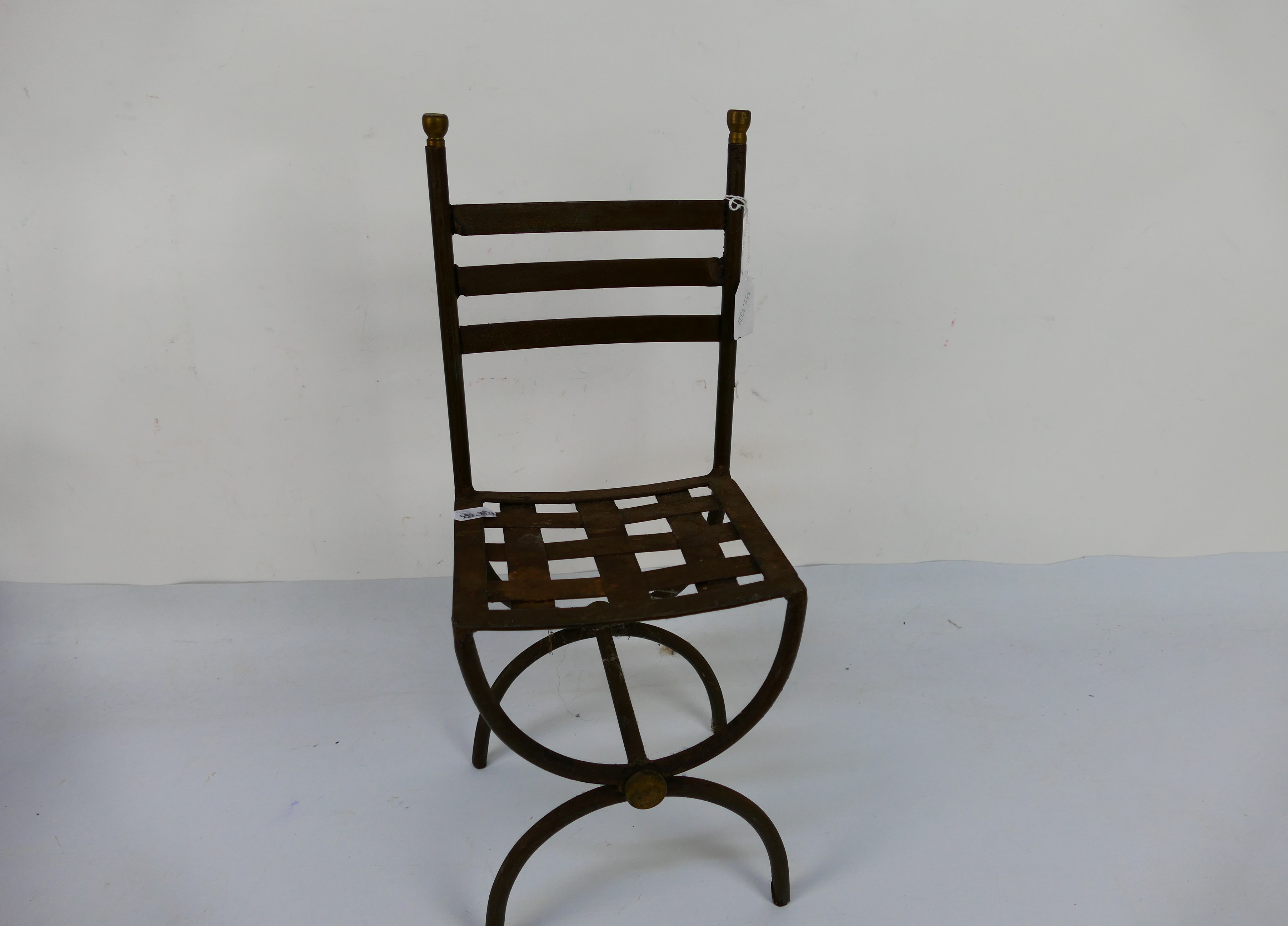 A figure depicting Charlie Chaplin in a seated pose with metal chair, approximately 57 cm (h). [2]. - Image 3 of 3