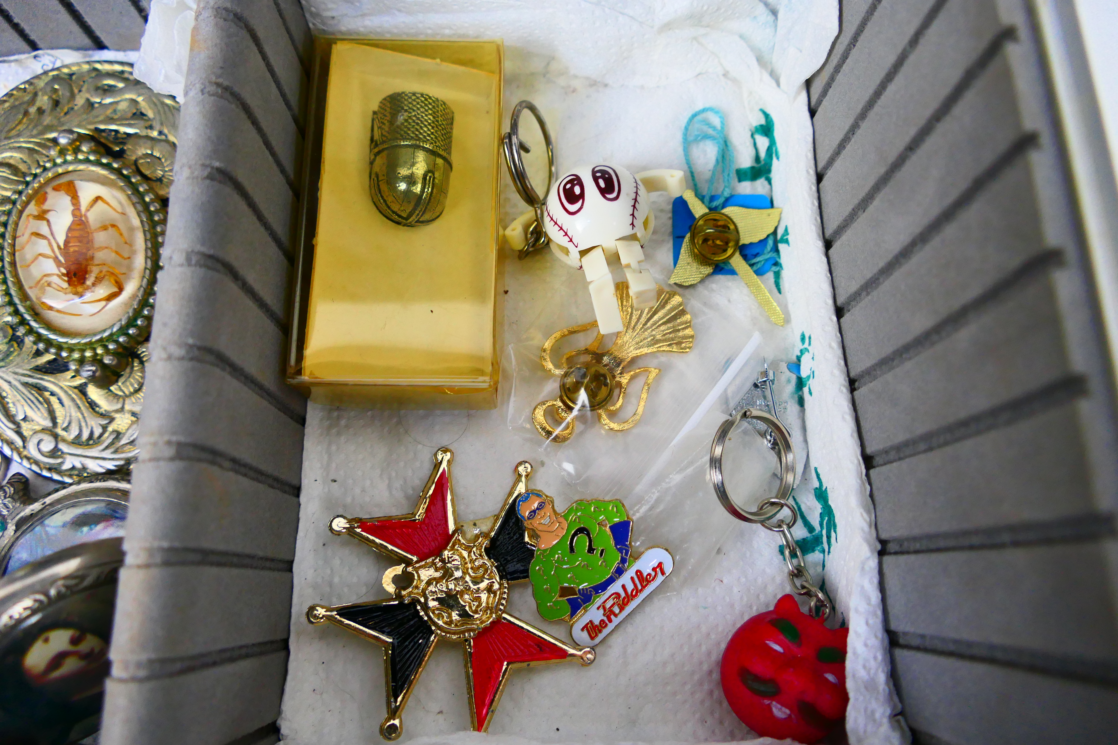 An aluminium case containing mixed collectables to include watches, sunglasses, belt buckles, - Image 8 of 8