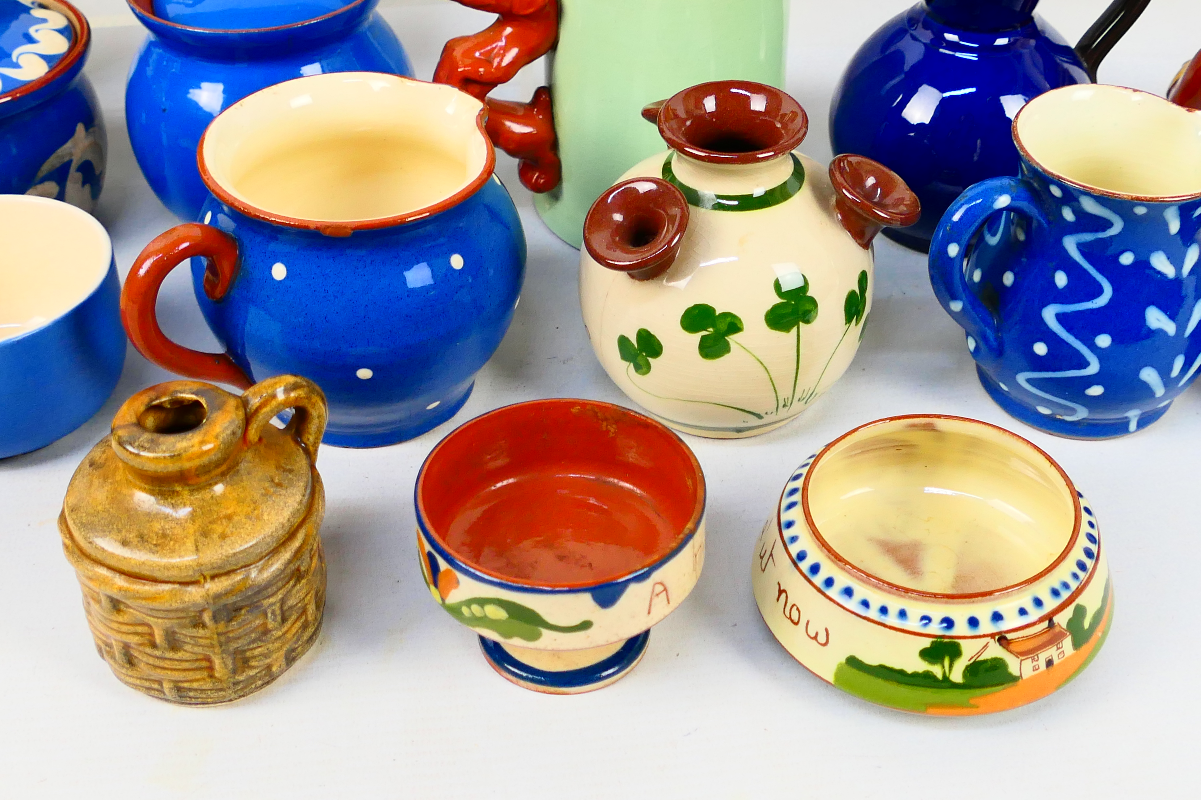 A collection of Torquay pottery wares to include bowls, jugs, cups and other, various manufacturers. - Image 20 of 20