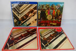 The Beatles - Lot to include Sgt Pepper's Lonely Hearts Club Band PCS7027 with cardboard cutout