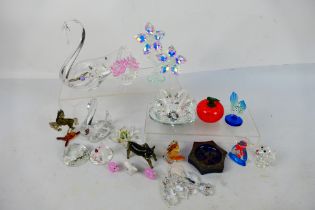 A collection of glassware to include animal figures, Swarovski style models and other.
