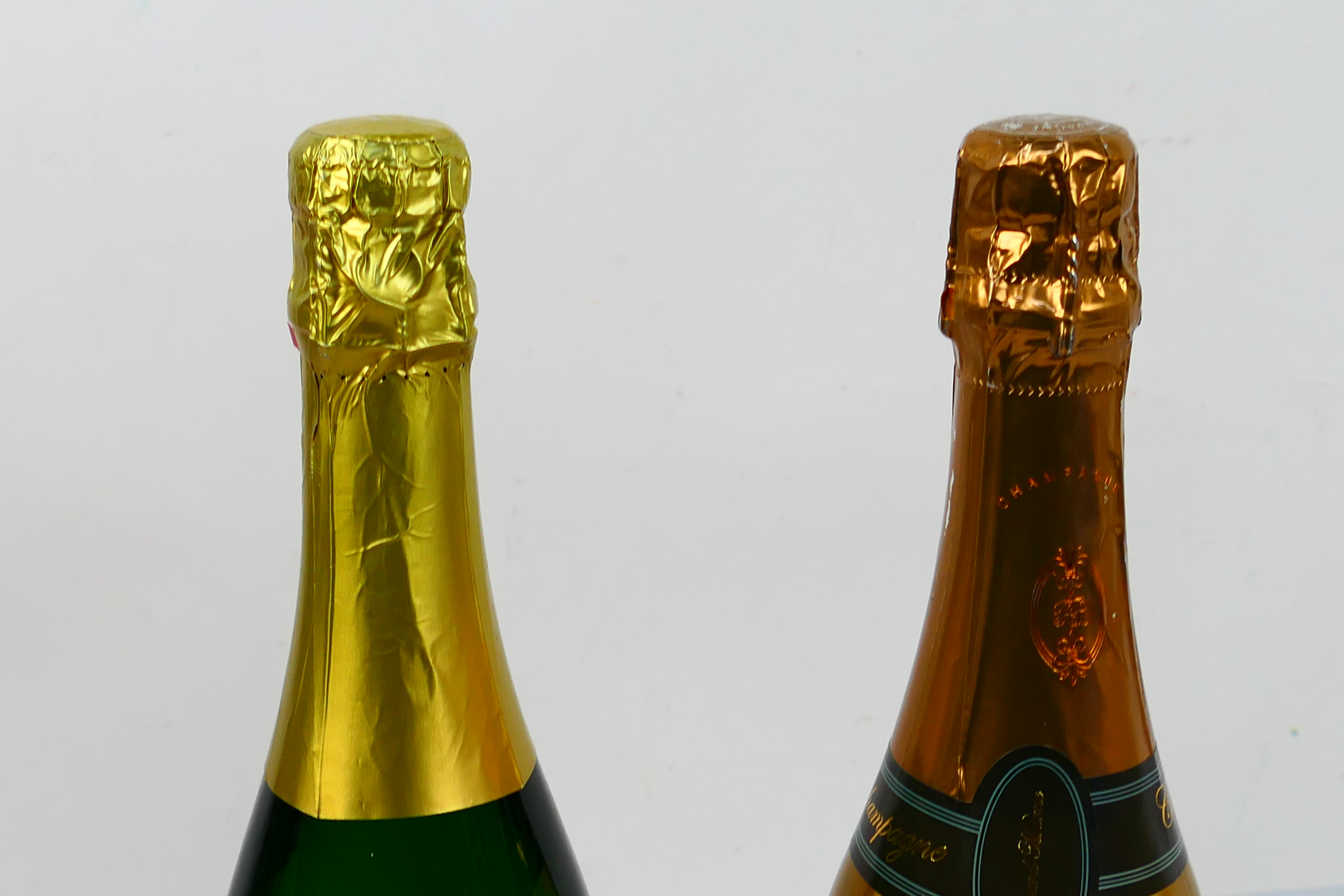 Two bottles of wine to include a 750ml bottle of Roger Barnier Curvee Demi-Sec Champagne. [2]. - Image 5 of 5