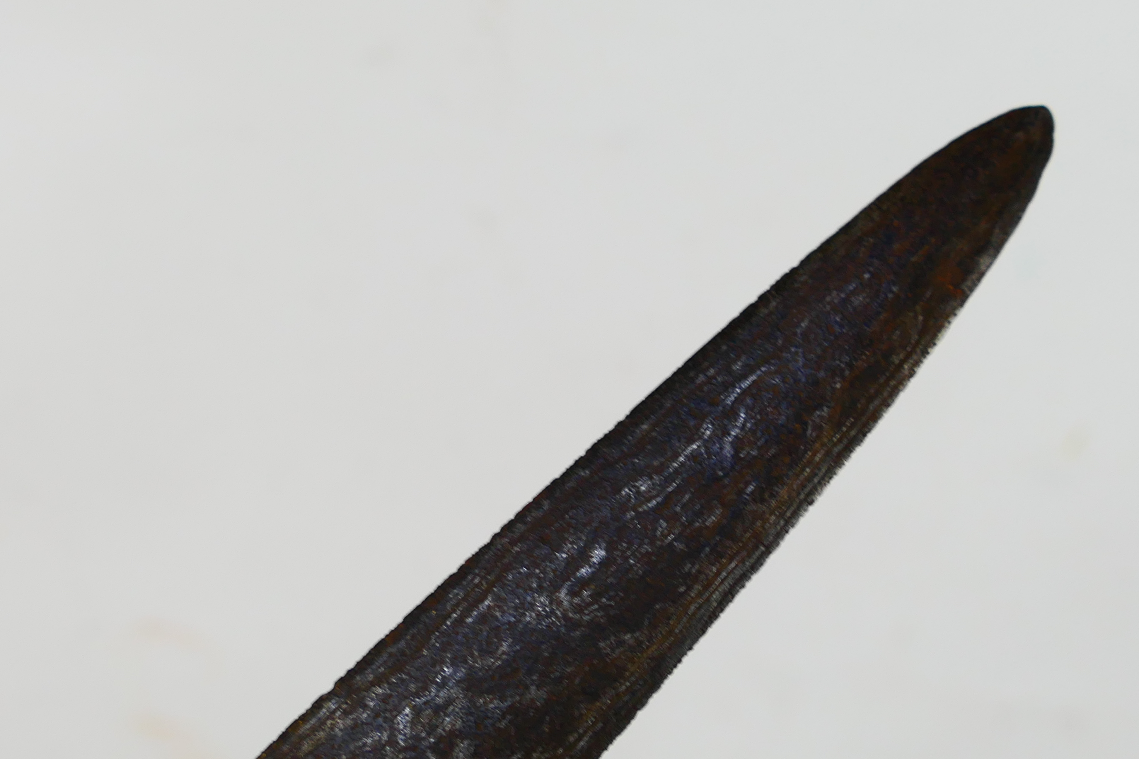 A late 19th or early 20th century Indonesian kris, 39 cm (l) blade and shaped carved hilt. - Image 9 of 12