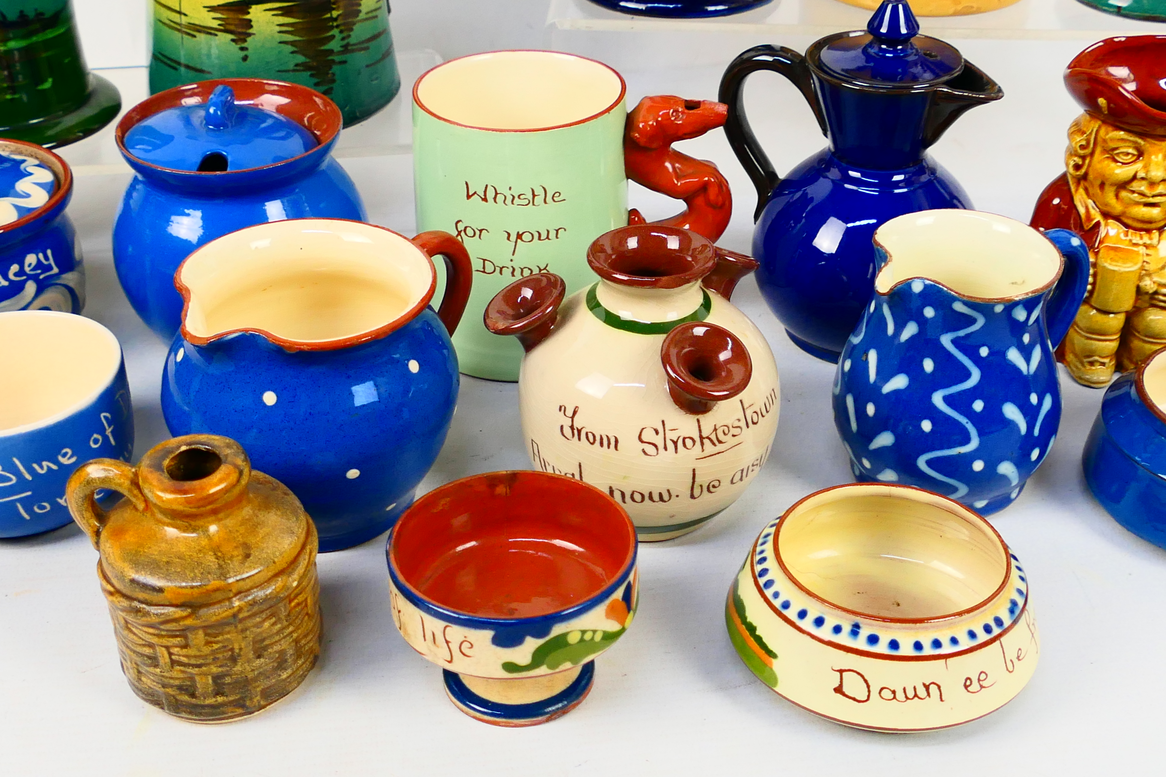 A collection of Torquay pottery wares to include bowls, jugs, cups and other, various manufacturers. - Image 13 of 20