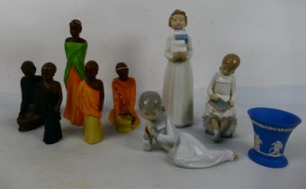 A group of ceramic figurines and similar to include three by Nao,