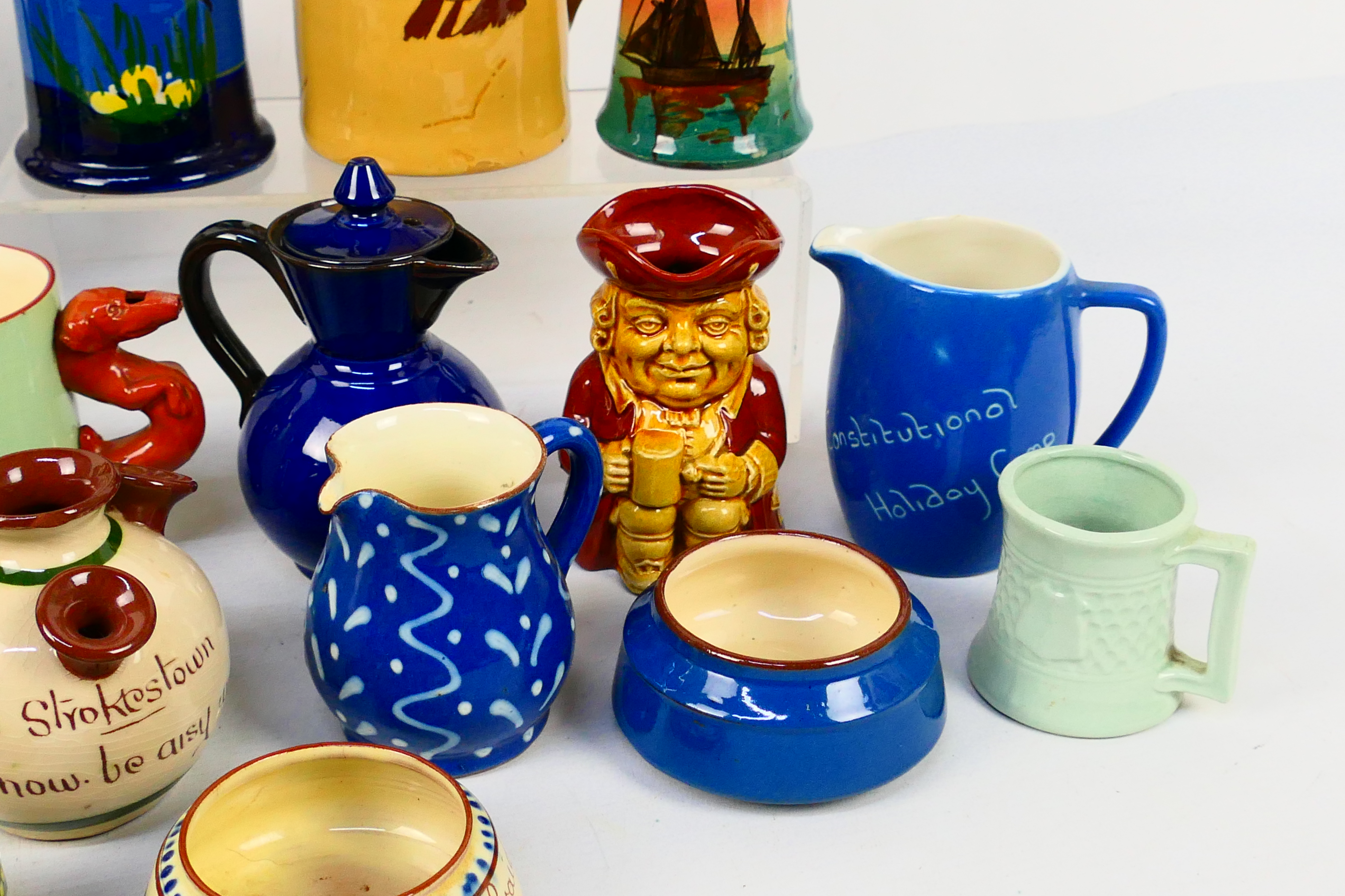 A collection of Torquay pottery wares to include bowls, jugs, cups and other, various manufacturers. - Image 14 of 20