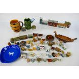 Wade - A collection of whimsies, whoppas, miniature buildings and other.