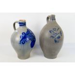 Two Westerwald style stoneware jugs, largest approximately 40 cm (h).