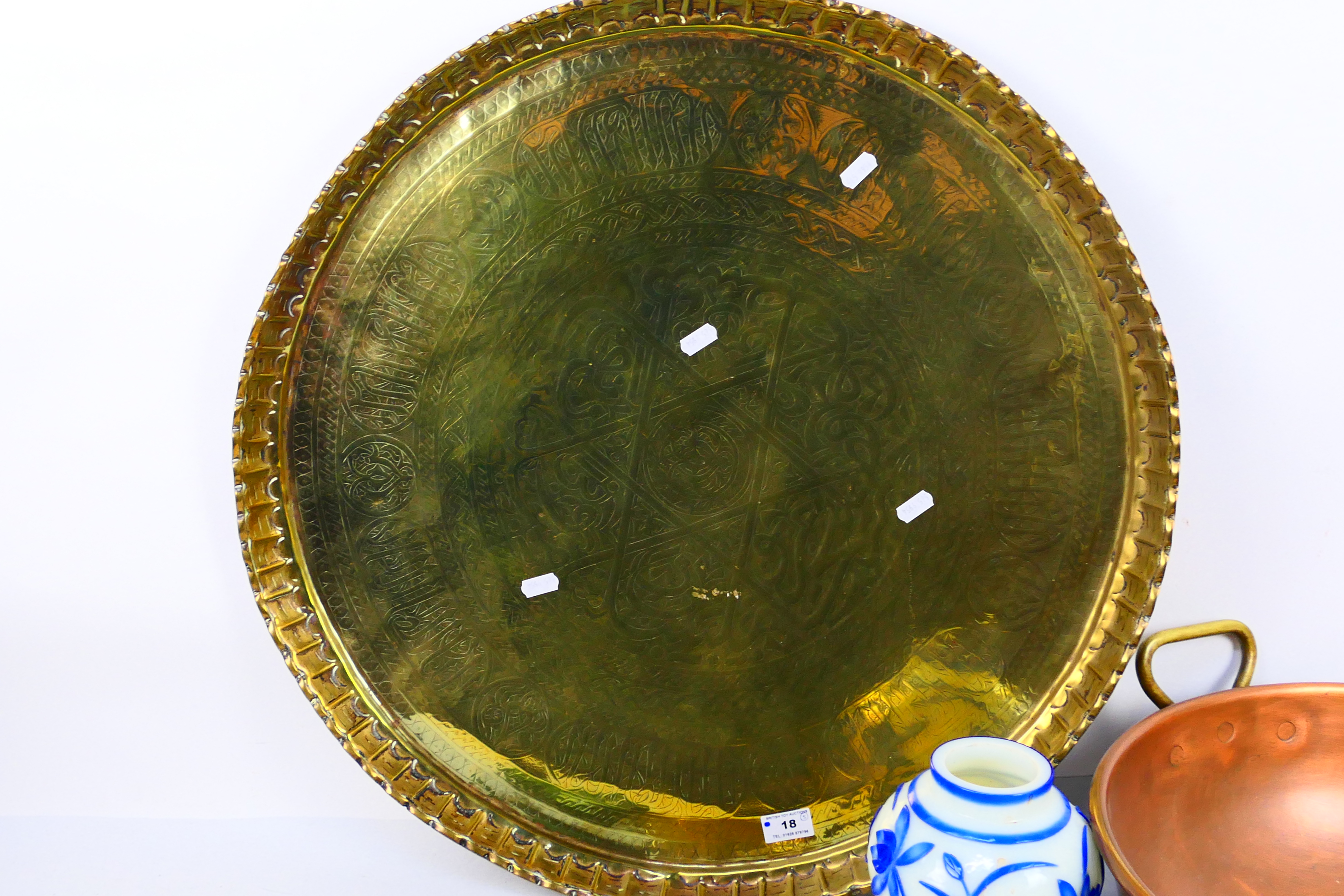 A large Islamic brass tray, 62 cm (d), copper bowl and two pieces of glassware. [5]. - Image 2 of 4