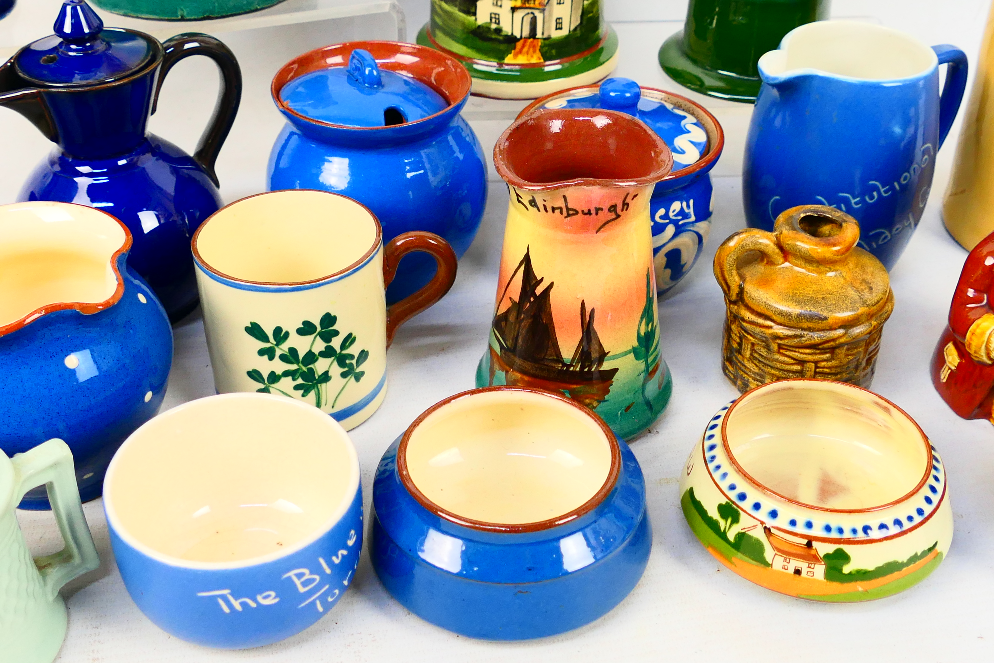 A collection of Torquay pottery wares to include bowls, jugs, cups and other, various manufacturers. - Image 4 of 20