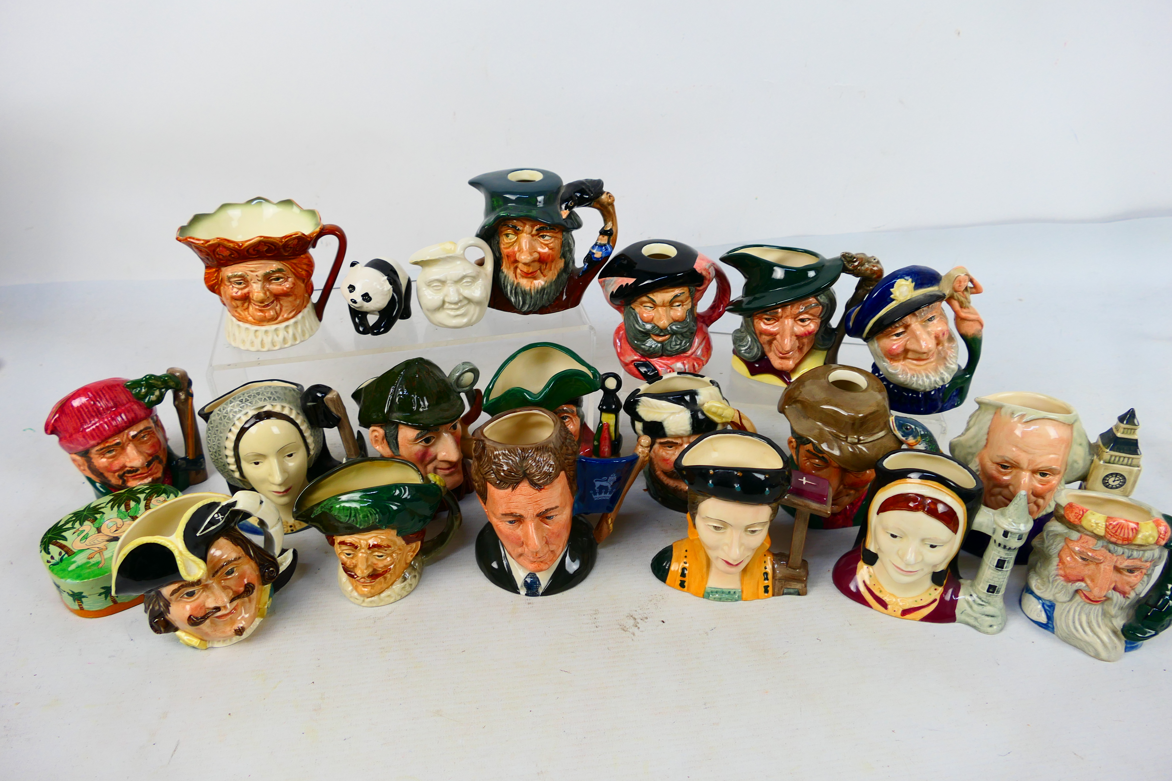 Royal Doulton - A collection of character jugs to include Captain Henry Morgan, John Doulton,
