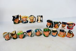 Royal Doulton - A collection of small character jugs to include Mad Hatter, Mark Twain, Golfer,