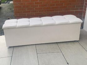 An upholstered ottoman, purchased from Bedstore, approximately 49 cm x 158 cm x 43 cm.