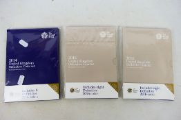 Three Royal Mint United Kingdom Definitive Coin Sets comprising a 2014 set and two 2016 sets.