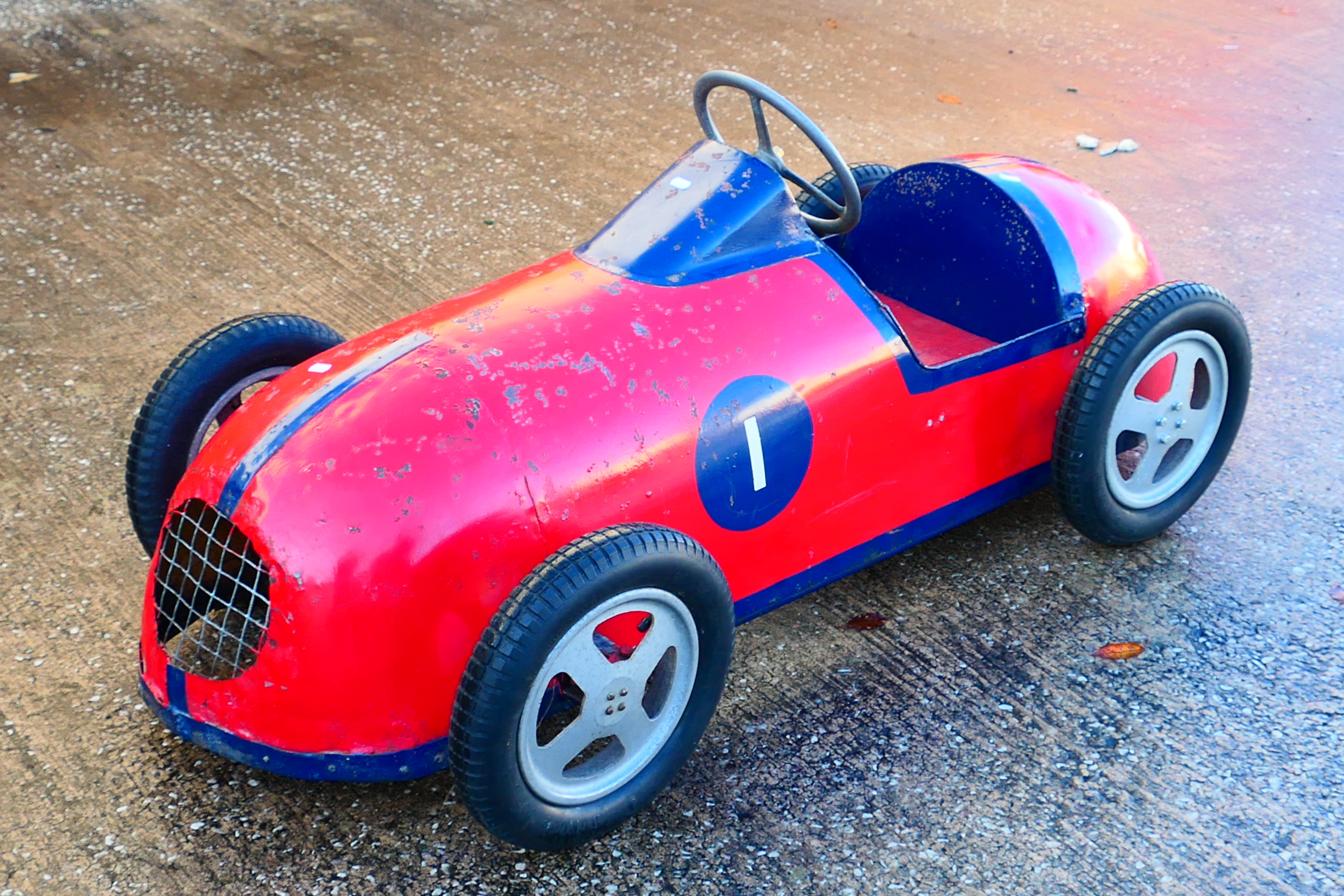 A rare early 1950s pedal car believed to be based on a Maserati racing car and made by a low volume