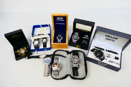 A collection of various wrist watches, part boxed.