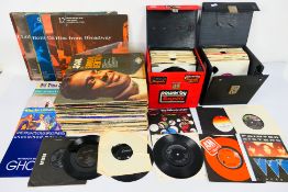 A collection of 12" and 7" vinyl records to include Stevie Wonder, ABBA,