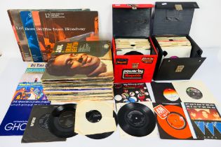 A collection of 12" and 7" vinyl records to include Stevie Wonder, ABBA,