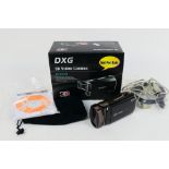 A boxed DXG 3D Video Camera, appears unused.