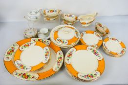 A quantity of Allertons dinner wares with floral decoration, retailed by Warings,