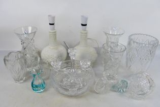 A quantity of glassware and two parian table lamps, 33 cm (h) to top of light fitting.
