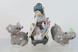 A Lladro figure depicting a Japanese lady in traditional dress, # 1450 Kiyoko,