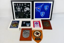 A collection of aviation / military related wall displays to include framed patches,