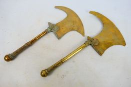 A pair of African brass Manzhi ceremonial axes, 40 cm. [2].