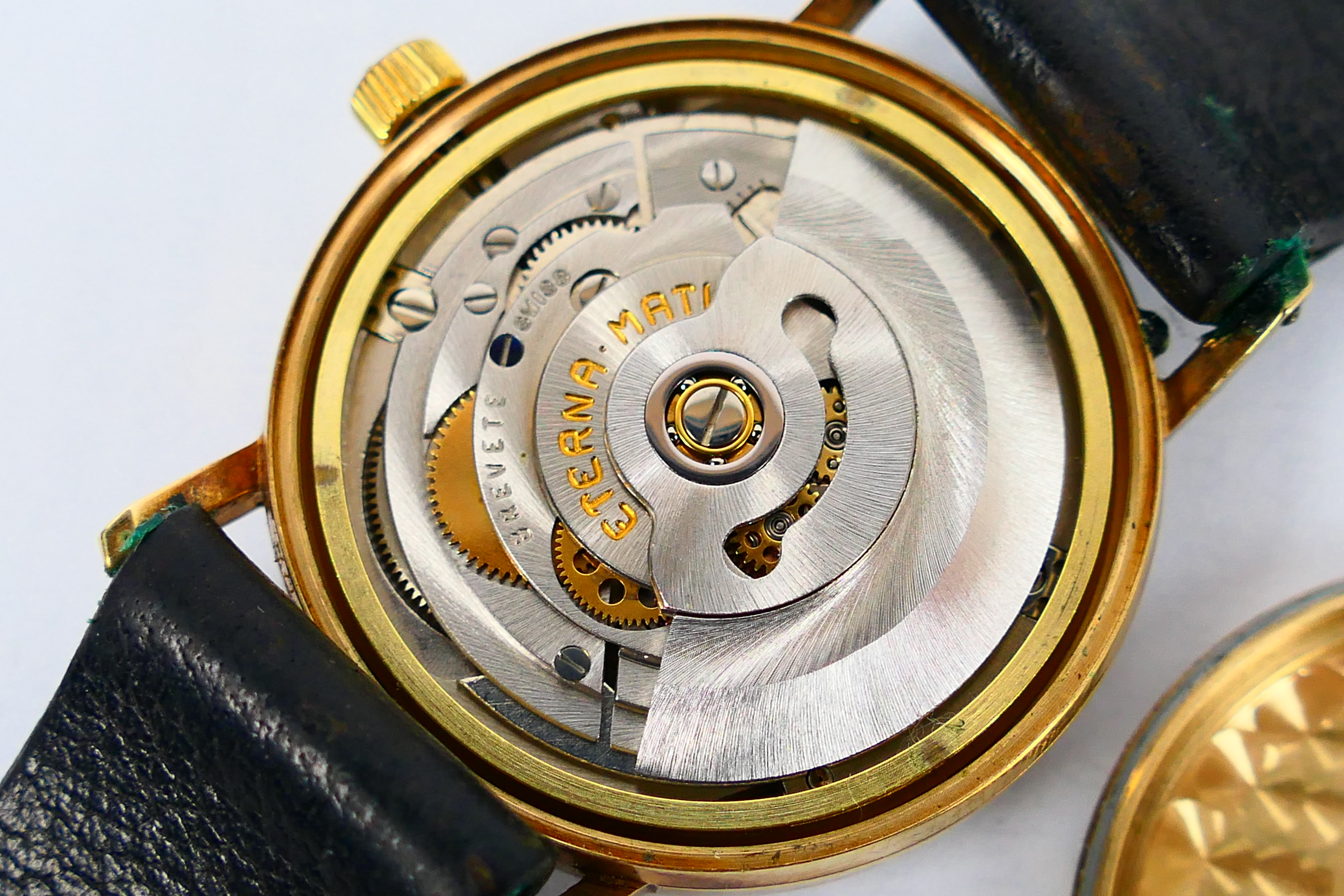 A gentleman's 9ct gold cased Eterna Matic wrist watch, retailed by Garrard, 3. - Image 6 of 7