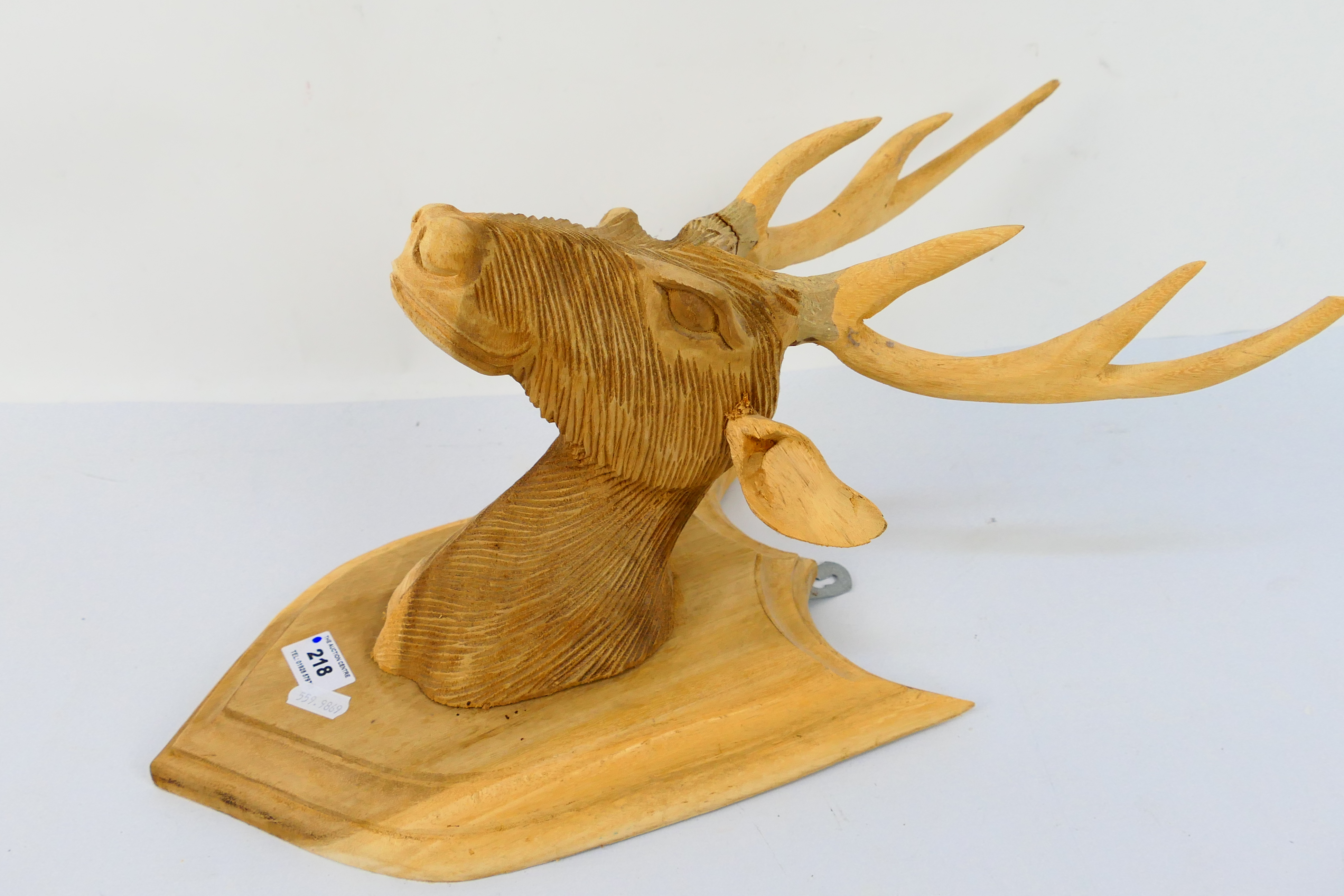 A carved wood hunting trophy on shield mount, approximately 47 cm. - Image 3 of 5