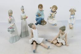 A group of Spanish porcelain figures to include Nao ballerinas and similar,