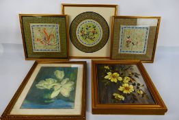 Three framed Chinese embroideries on silk, framed under glass,