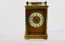 A late 19th / early 20th century French gong striking carriage clock with repeat mechanism,