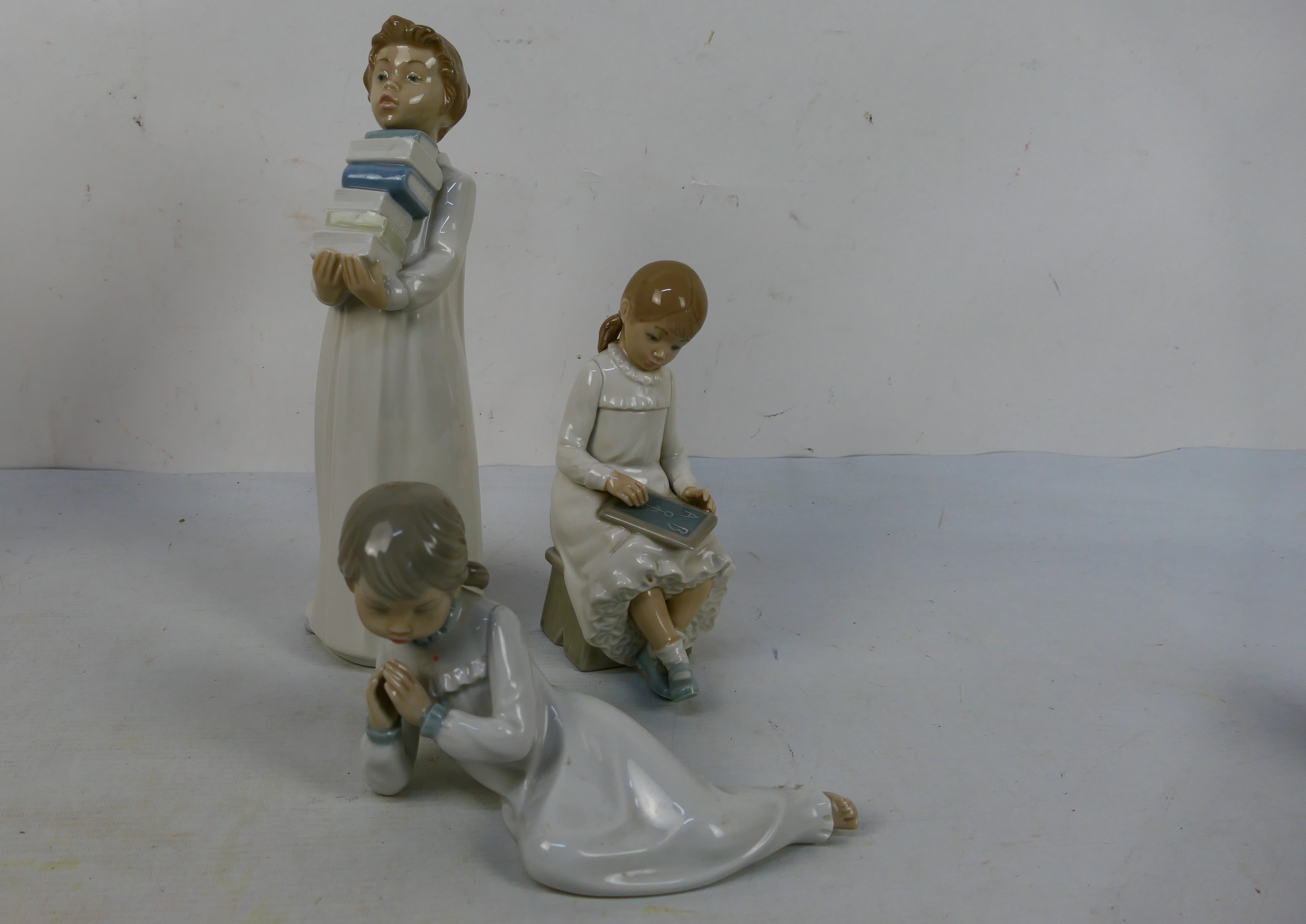 A group of ceramic figurines and similar to include three by Nao, - Image 4 of 6