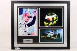 Formula One - A display montage relating to Jensen Button comprising signed photograph in Brawn GP
