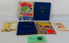 A collection of UK and foreign stamps and a small quantity of philatelic literature.