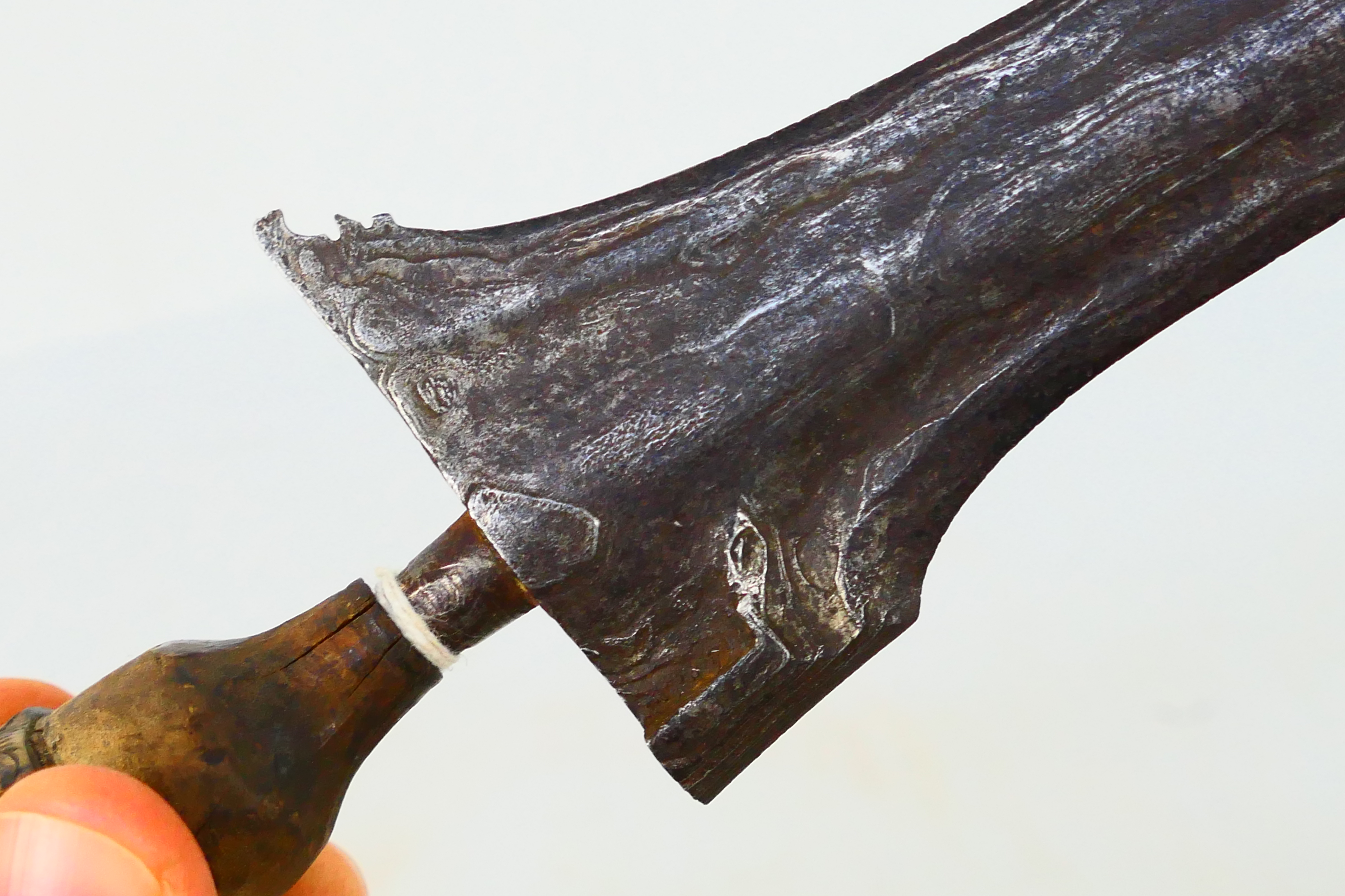 A late 19th or early 20th century Indonesian kris, 39 cm (l) blade and shaped carved hilt. - Image 10 of 12