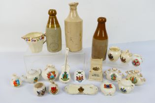 A small quantity of crested ware and stoneware bottles.