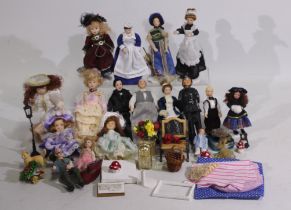 A collection of dolls house accessories, furniture and dolls to include chair, clock, flowers,