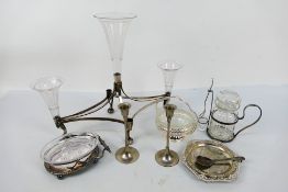 Plated and other metal ware to include an epergne, candlesticks, dishes and other.