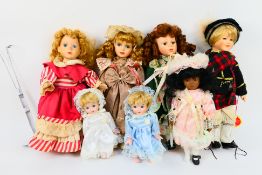 A quantity of collectable dolls, largest approximately 40 cm (h).