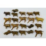 A collection of bronze animal figures, sheep and calf, approximately 4 cm (l).