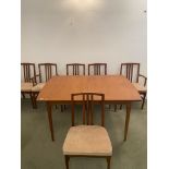 A Sutcliffe of Todmorden dining table and six chairs (4+2),