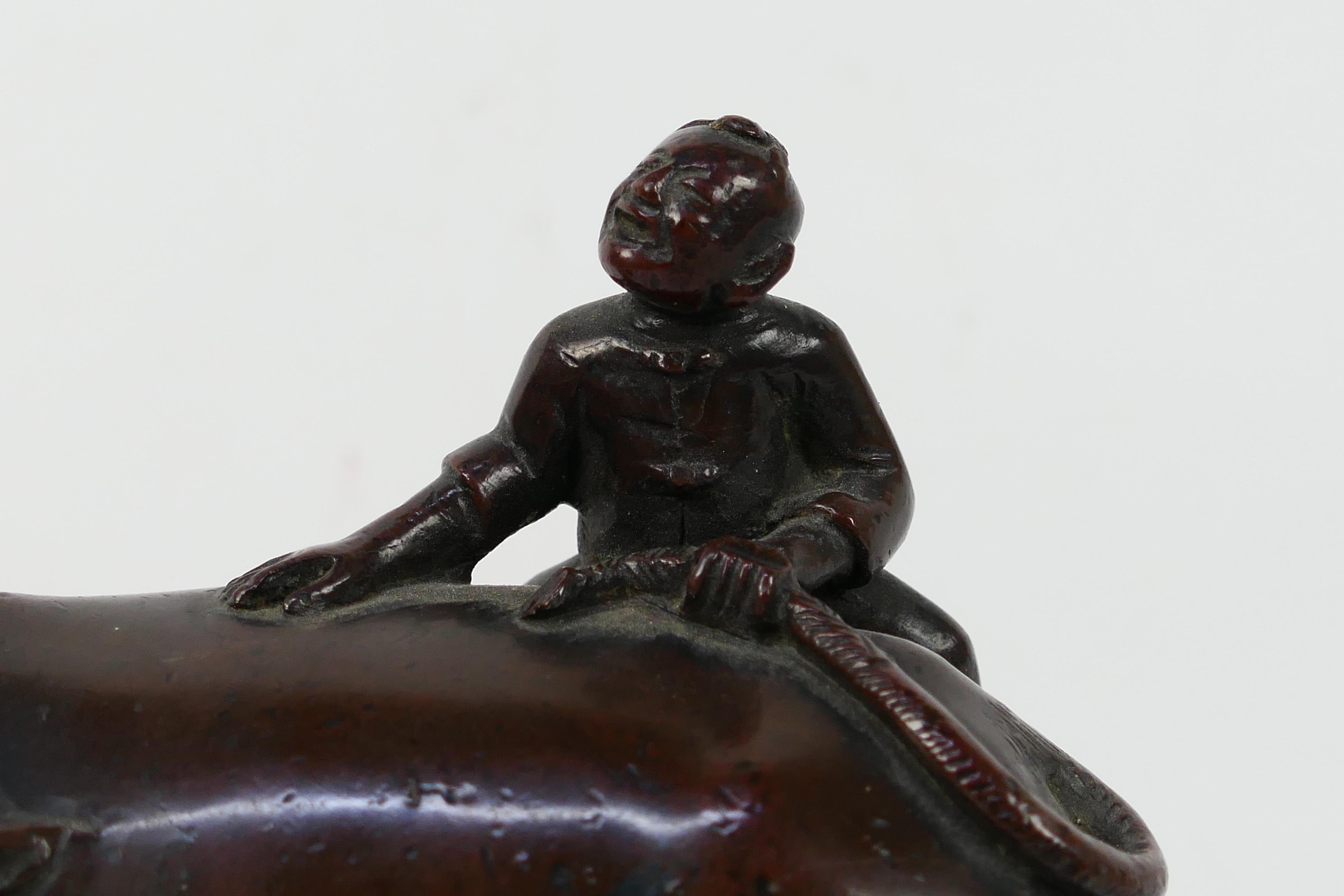 A Chinese bronze Buffalo and Boy group modelled as a boy atop a buffalo (A/F), - Image 2 of 4