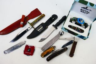 A collection of vintage knives, multi-tools and similar and a boxed watch and knife set.