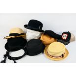 A varied collection of gentleman's hats.