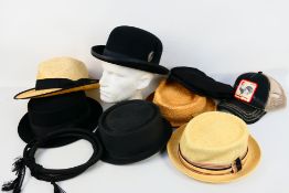 A varied collection of gentleman's hats.