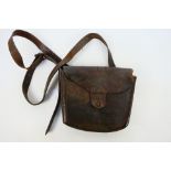 A World War One (WW1 / WWI) leather pouch and strap.