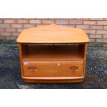 An Ercol Windsor model 1130 corner drop-leaf television stand, with single drawer,