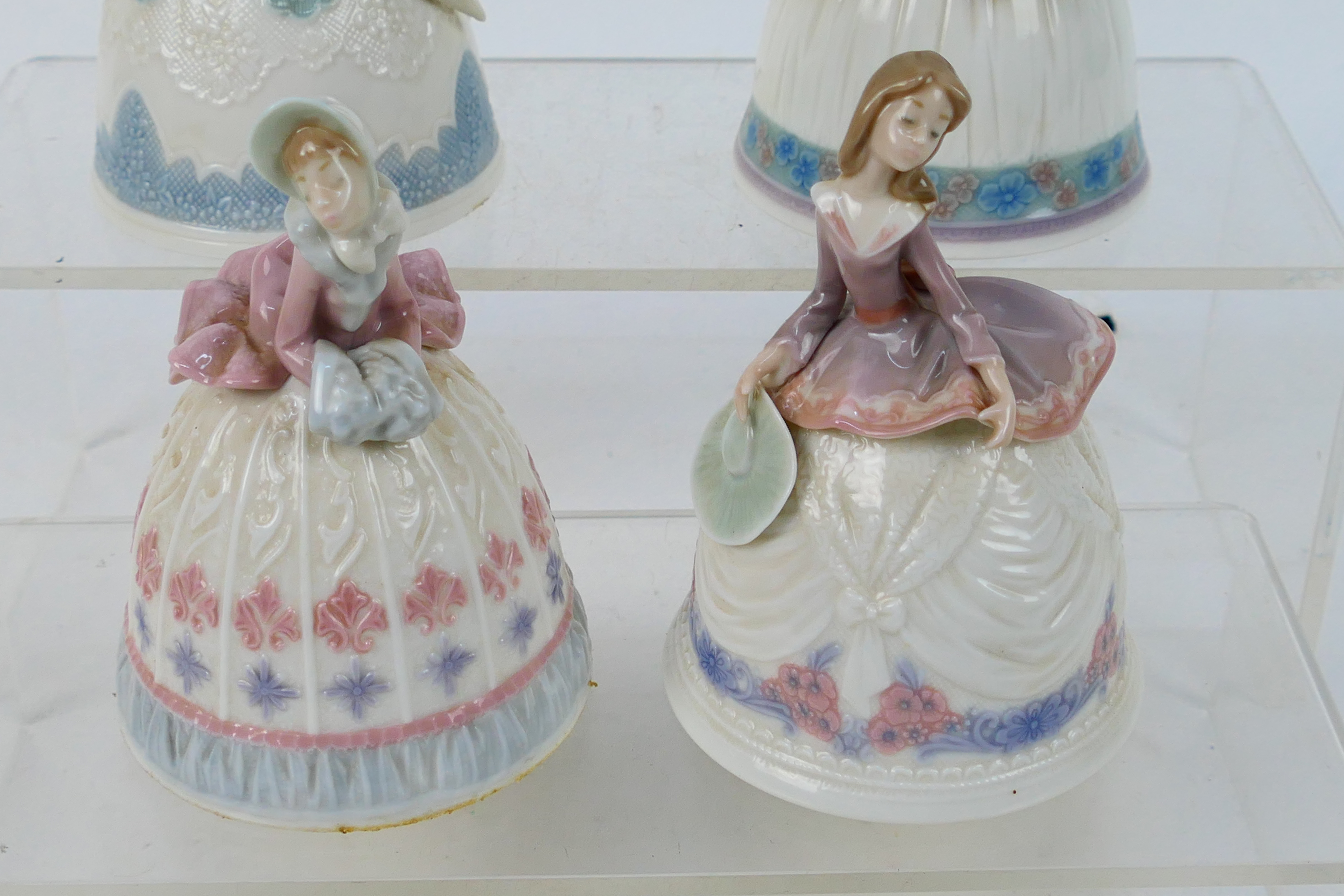 Lladro - Four porcelain bells in the form of ladies, approximately 12 cm (h). - Image 2 of 6